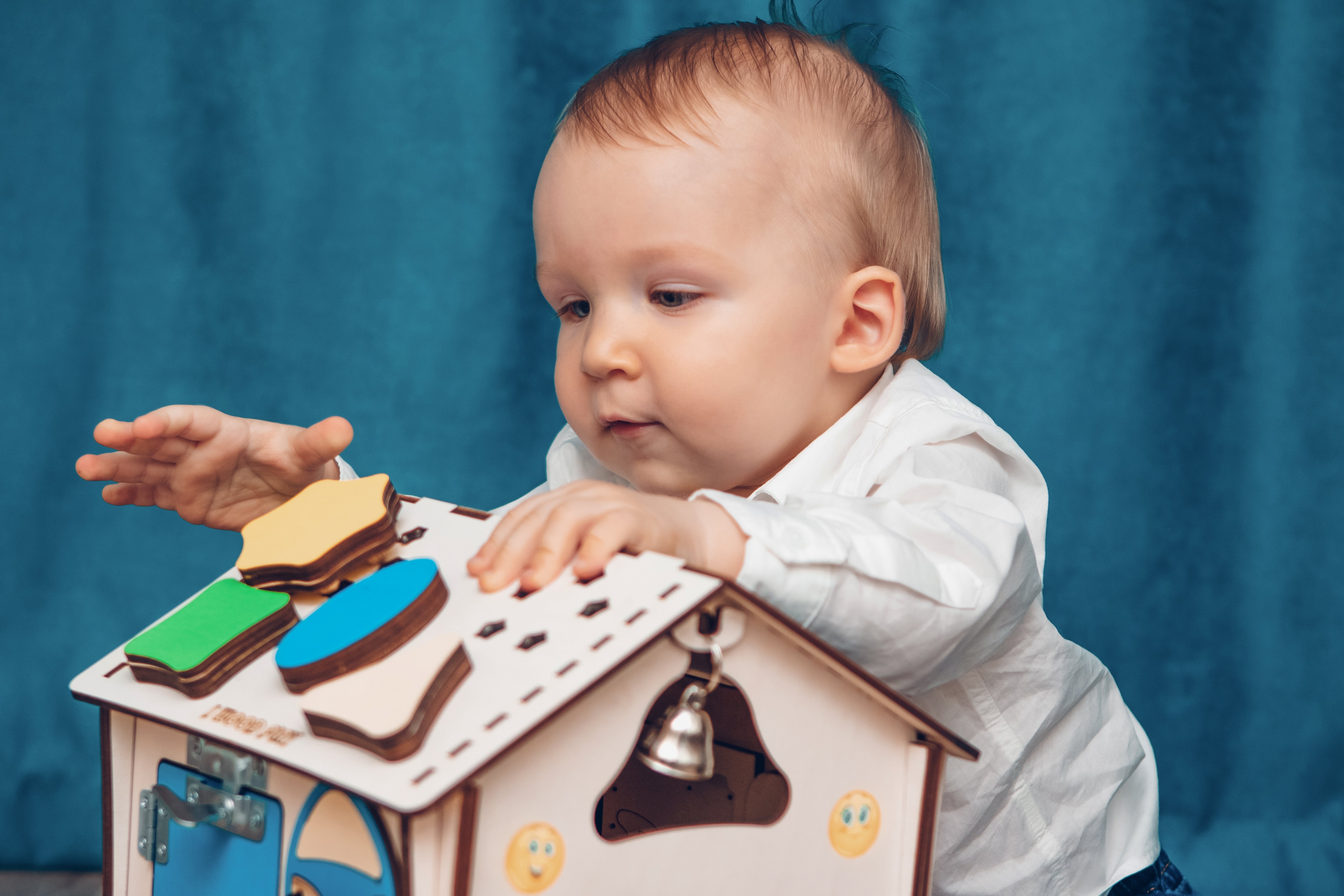 baby playing with blocks